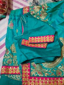 Teal Embroidered Silk Saree