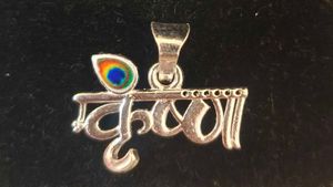 Krishna Pendant with Peacock Feather Design