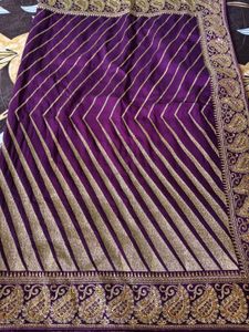 Elegant Purple Saree with Gold Stripes