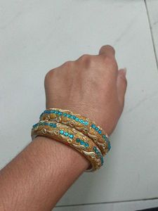 Exquisite Golden Bangles with Blue Stones
