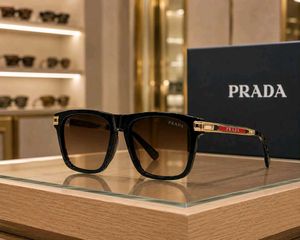 Prada Sunglasses - Black Frame