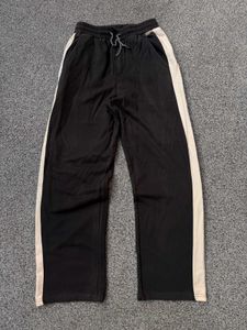 Black Track Pants with White Stripes