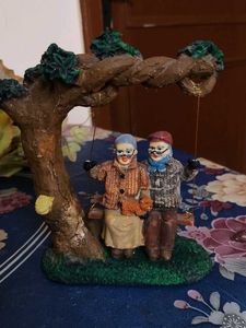 Vintage Couple on Swing Figurine