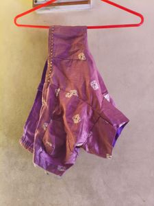 Elegant Purple Saree with Circular Motifs