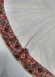 Elegant White Lehenga with Embellished Border