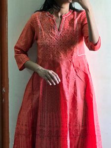Elegant Coral Kurta with Intricate Print