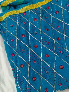 Sparkling Teal Saree with Embellishments