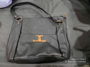 Stylish Black Faux Leather Handbag from malaysia