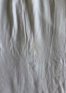Elegant White Top with Textured Yoke