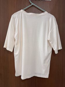 Cream T-Shirt with Embroidered Flower