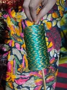 Elegant Green Glass Bangles with Gold Accents