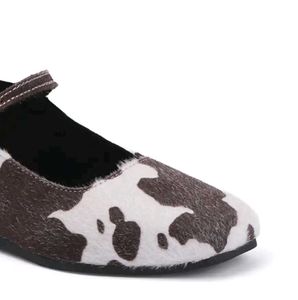 pair of multicoloured Mary Janes