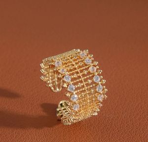 Elegant Gold Tone Ring with Crystals