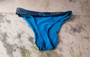 Stylish Blue Bikini Bottoms with Geometric Trim