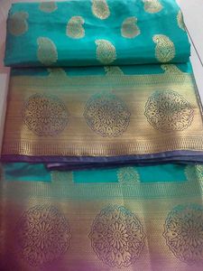 Teal Saree with Gold Paisley & Floral Motifs