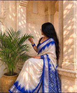 Elegant Off-White Saree with Blue Border
