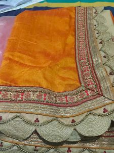 Stunning Orange Embroidered Saree