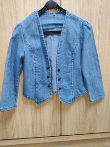 Blue denim jacket.