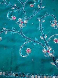 Stunning Teal Saree with Embellishments