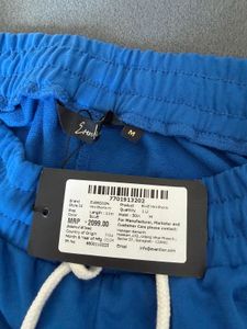 Brand new Blue Athletic Shorts with White Trim