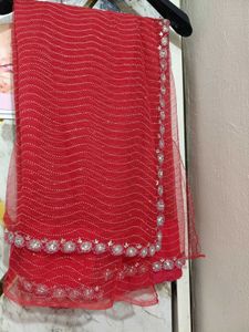 Stunning Red gand stone work saree with blause net