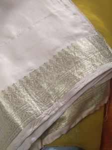 Elegant Cream Saree with Golden Border
