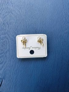 Pearl Bow Stud Earrings