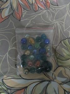 Bag of colorful glass marbles