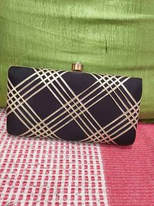 Elegant Black & Gold Clutch Bag