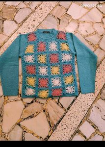 27. Crocheted Granny Square Sweater