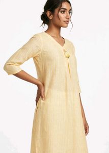 Elegant Yellow Striped Kurta with Tassel Detail