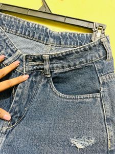 Distressed Blue Denim Jeans