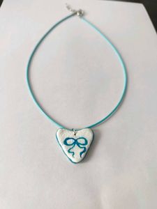 Coquette bowstring necklace