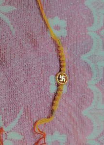 Beautiful Rakhi with Swastik Symbol