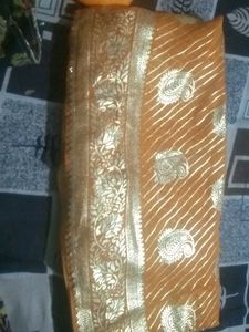 Elegant Yellow Saree with Golden Print
