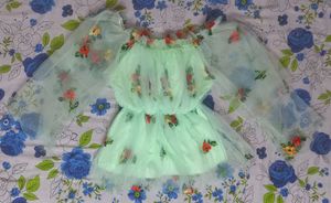 Romantic, fairycore-inspired mint green top
