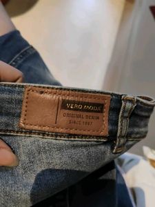 Distressed Blue Denim Jeans