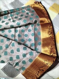 Elegant Silk Saree with Teal Motifs