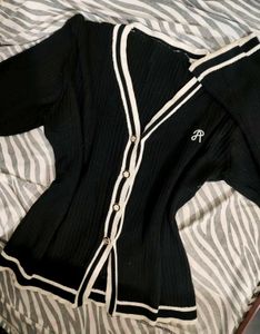 Chic Black Ribbed Cardigan with White Trim