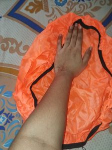 Bright Orange backpack rainy cover