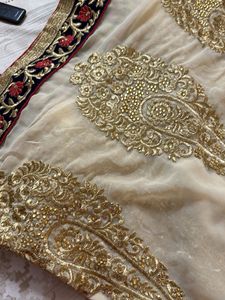 Elegant Cream Saree with Gold Embroidery
