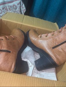 Stylish Brown Lace-Up Boots with Embellishments