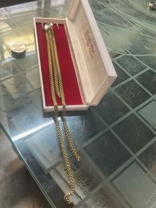 gold snack chain brooch with diamond