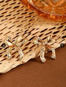 Gold Bow Stud Earrings
