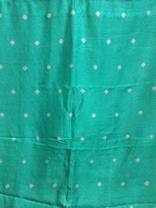 Elegant Teal Saree with Subtle Motifs