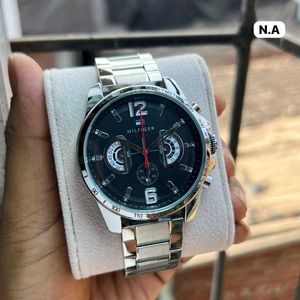 Tommy Hilfiger • Dial: Blue with chronograph-style