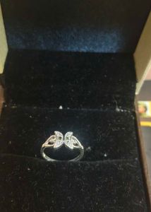 Elegant Silver Ring with Green Stones