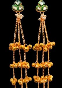 Elegant Gold Tassel Earrings with Green Stone