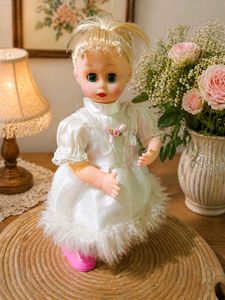 Vintage Doll with White Dress