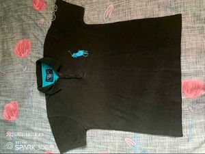 Classic Black Polo Shirt with Teal Accents